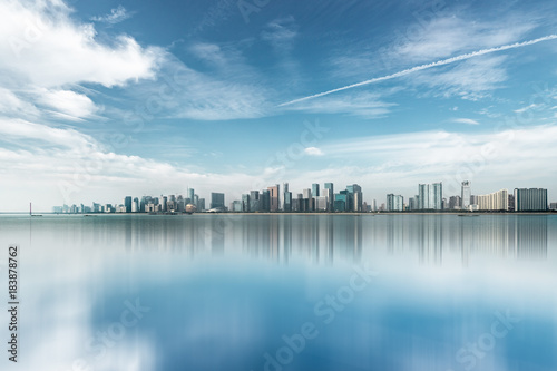 urban skyline and modern buildings under blue sky, cityscape of China