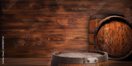 Vászonkép Rustic wooden barrel on a night background
