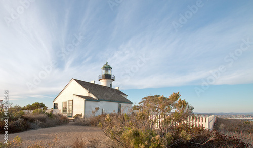 OLD POINT LOMA LIGHTHOUSE AT CABRILLO NATIONAL MONUMENT UNDER BLUE CIRRUS CLOUDSCAPE AT POINT LOMA SAN DIEGO IN SOUTHERN CALIFORNIA UNITED STATES