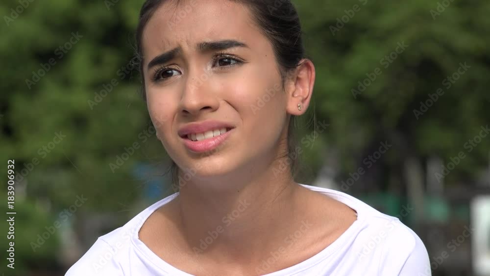 Worried Young Hispanic Female Teen Worried Young Hispanic Female Teen