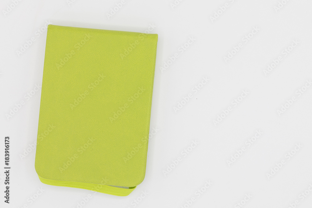 Closeup of Green blank notebook isolated on white background. copy space Closeup of Green blank notebook isolated on white background. copy space