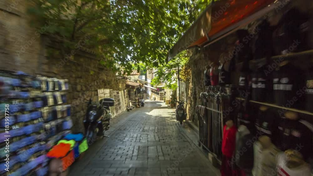 Walk through the tourist market with wide range of sunglasses, magnets, arabian lamps and other souvenirs timelapse hyperlapse in Antalya. Walk through the tourist market with wide range of sunglasses, magnets, arabian lamps and other souvenirs timelapse hyperlapse in Antalya.