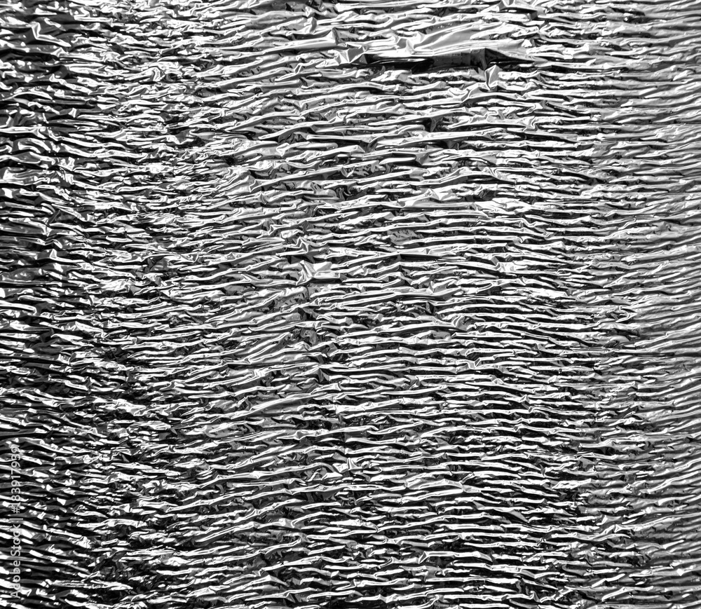 Silver foil as an abstract background Silver foil as an abstract background