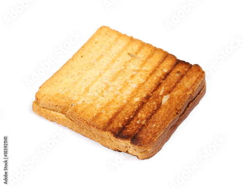 Integral fried whole wheat toast bread slices isolated on white background