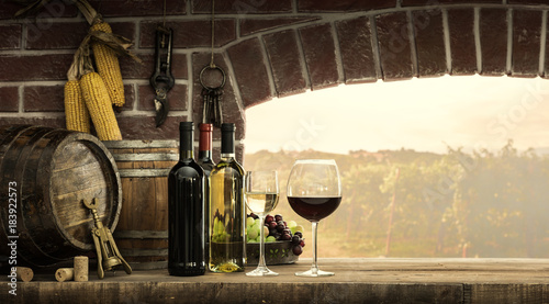 Fototapeta Naklejka Na Ścianę i Meble -  Cellar window and wine bottles