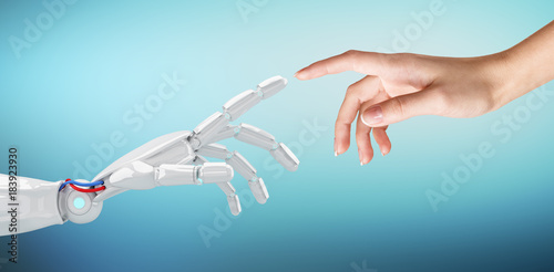 Human hand touching an android hand. photo