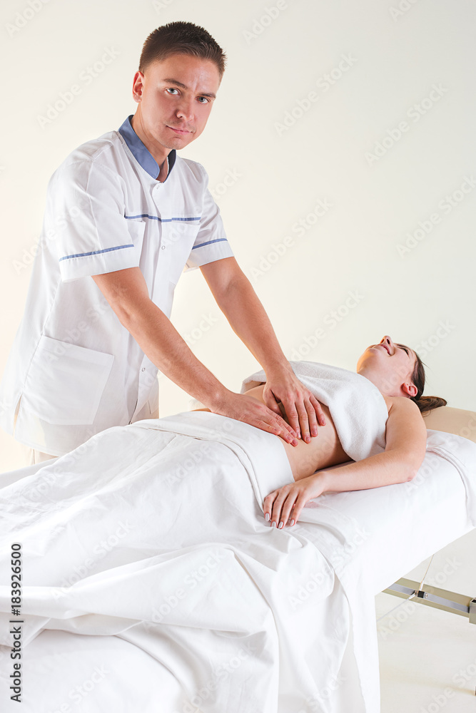 Obraz premium The picture of beautiful woman in massage salon