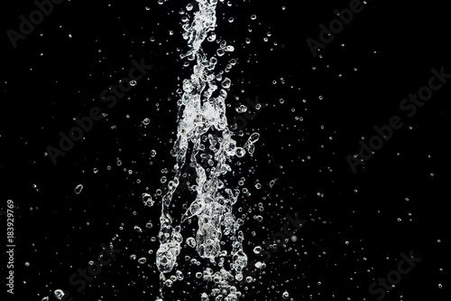 clear splash water isolated on black
