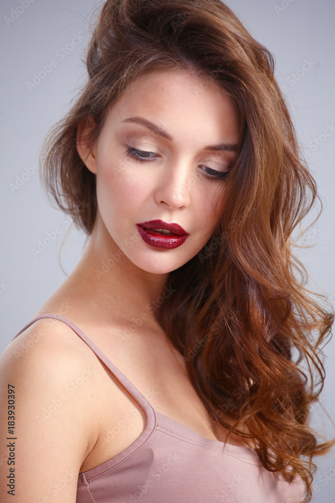 Portrait of beautiful woman , isolated on gray background. Portrait of beautiful woman , isolated on gray background.