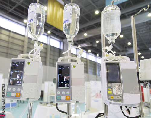 modern digital infusion pump for medical purposes in a line photo