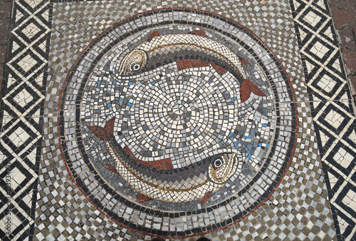 Religious christian mosaic with two fishes 