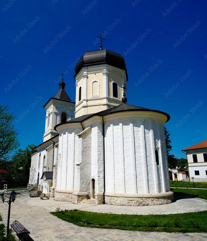 Exterior view to stone summer Dormition church at orthodox Capriana monastery , Moldova