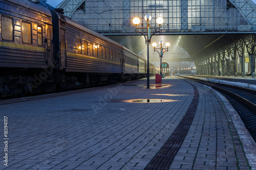 Fotografie Photos of trains on evening train station