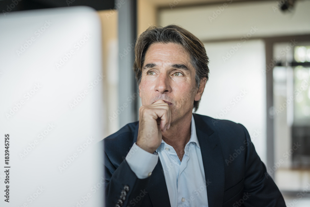© Westend61 - Portrait of businessman in office thinking © Westend61 - Portrait of businessman in office thinking