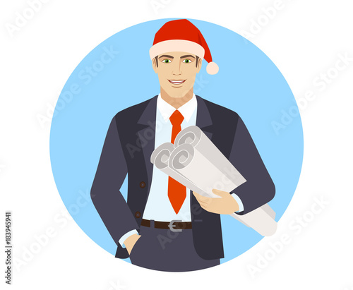 Businessman in Santa hat holding the project plans
