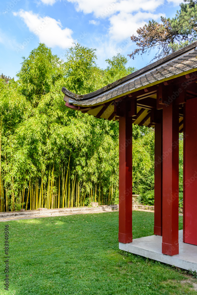 A buddhist temple with a bamboo grove A buddhist temple with a bamboo grove
