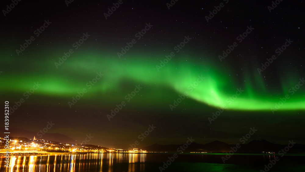 Aurora borealis or northern lights in the sky at Tromso, Norway
