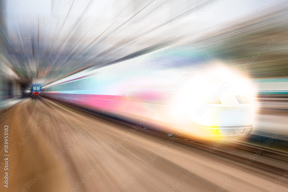 Fototapeta premium Modern high speed train on a clear day with motion blur