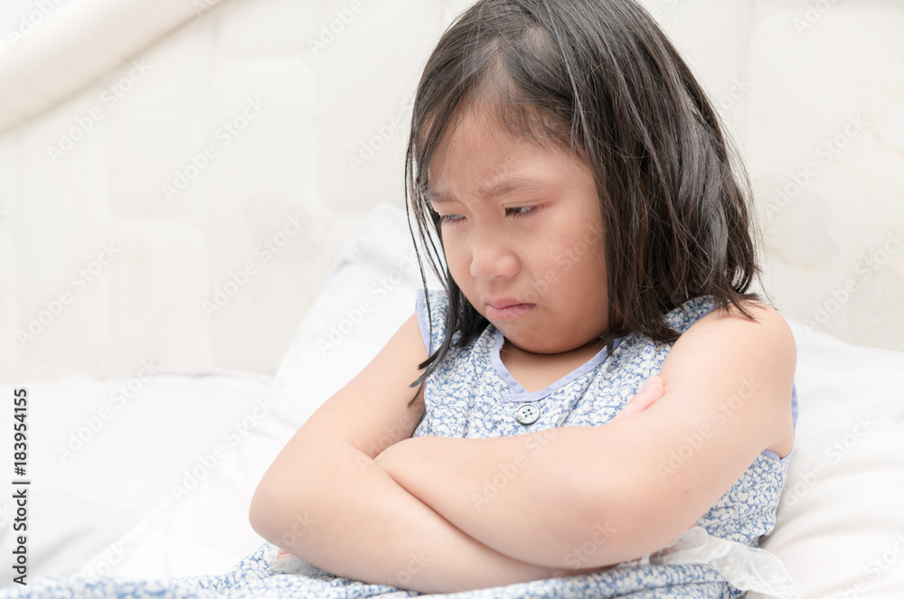 Little girl crying with tears on her cheeks Little girl crying with tears on her cheeks