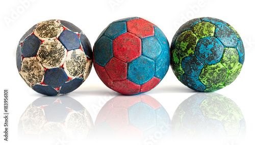 Row of Handball Balls with Reflection, colorful, covered in handball resin, used in game play
