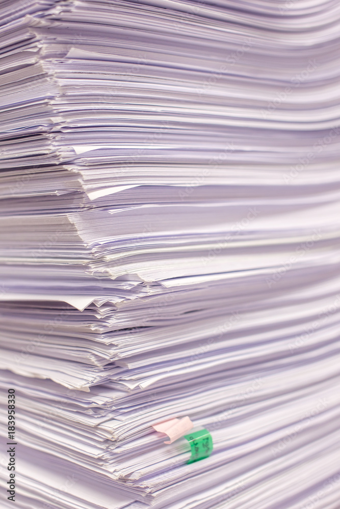 Pile of papers and document stacked on the table close up. Pile of papers and document stacked on the table close up.