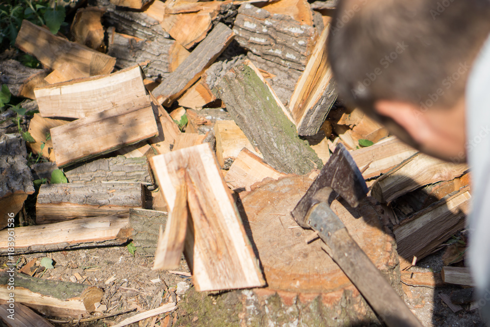Close up of a pile of cracked wood in a rural yard. Shallow depth of field. Close up of a pile of cracked wood in a rural yard. Shallow depth of field.