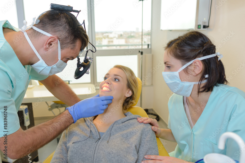 dentist checking the gums dentist checking the gums