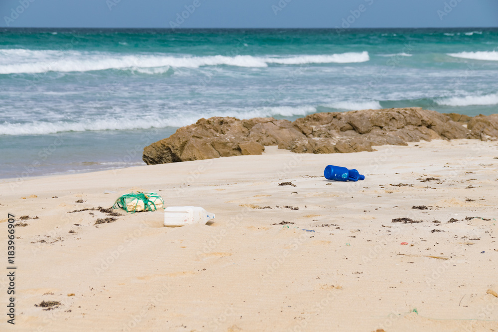 Plastic rubbish brought in on the Atlantic Ocean tide discarded on Santa Maria Beach, Boa Vista, Cape Verde Plastic rubbish brought in on the Atlantic Ocean tide discarded on Santa Maria Beach, Boa Vista, Cape Verde