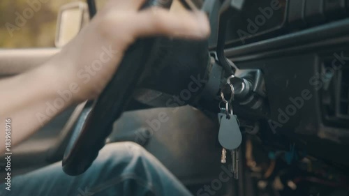 Old car's keys in ignition while driving