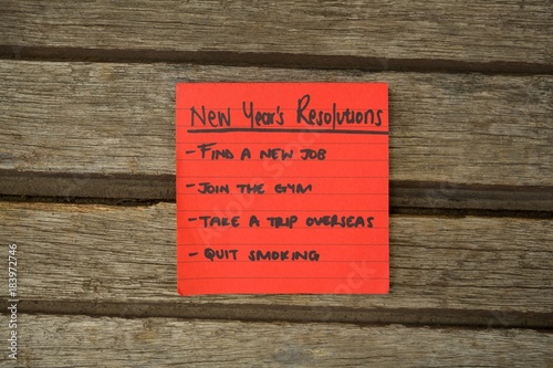 New year resolution written on sticky notes photo