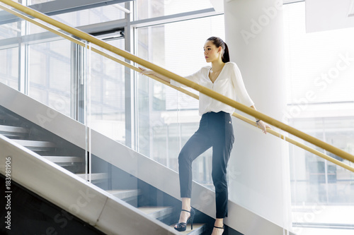 Businesswoman on stairs