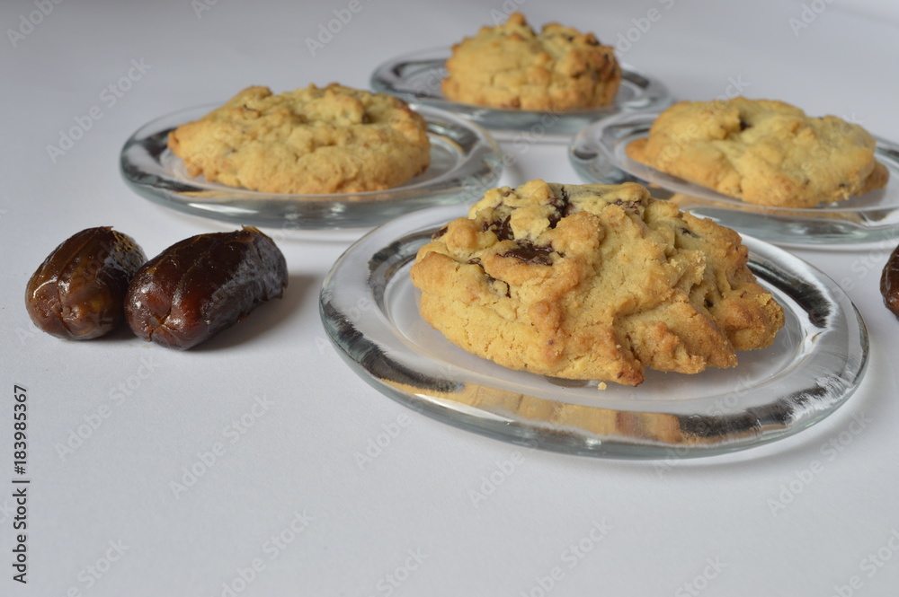 Homemade delicate butter cookies with chocolate drops and dried dates Homemade delicate butter cookies with chocolate drops and dried dates