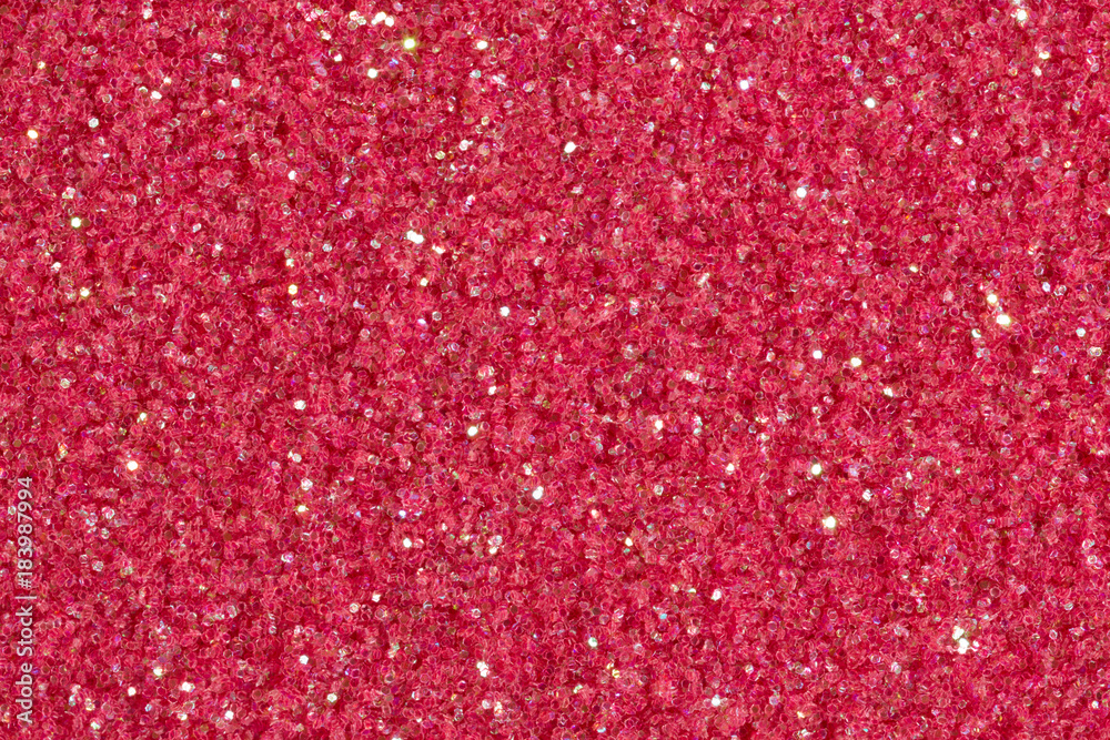 Pink background with glitter with light.