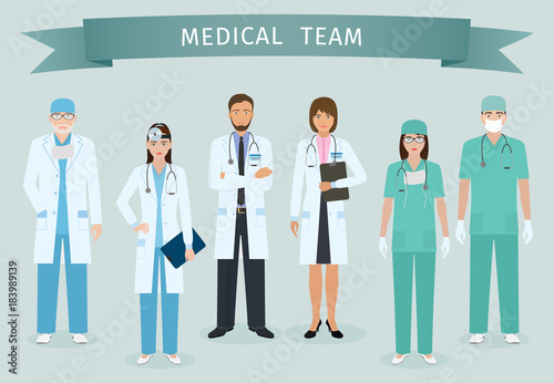 Group of doctors and nurses standing together with award ribbon. Medical people. Hospital staff.