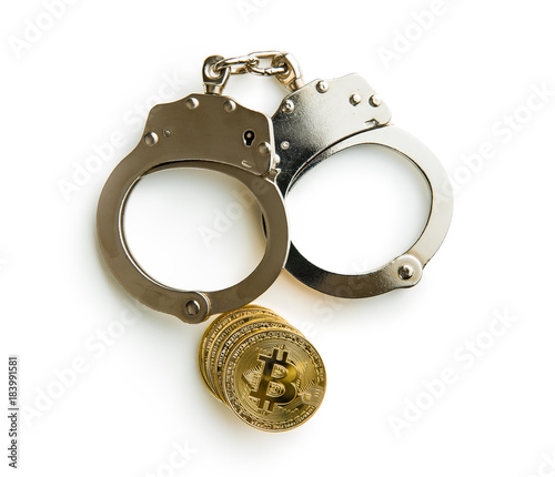 Golden bitcoins. Cryptocurrency and hancuffs.