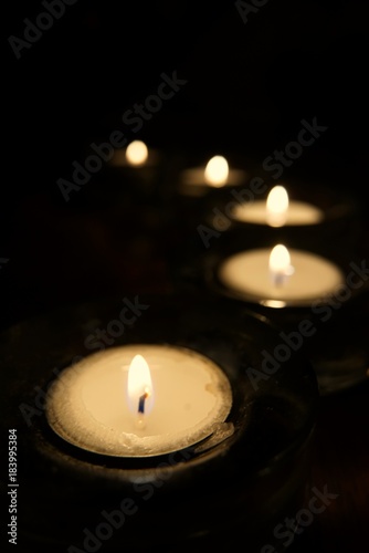 Candles in curve shape with fall off focus