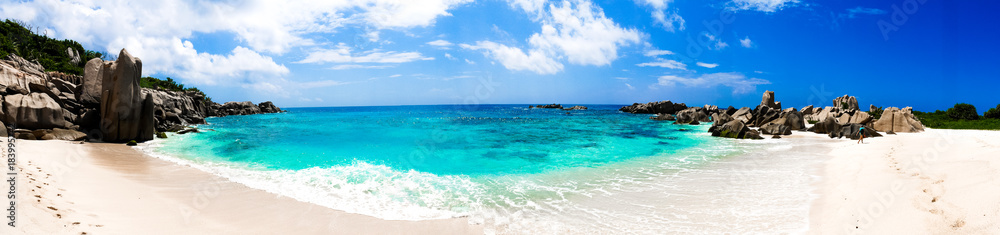 Large Panorama of the pathway for an amazing natural beach, tropical landscape Anse Marron, La Digue, Seychelles