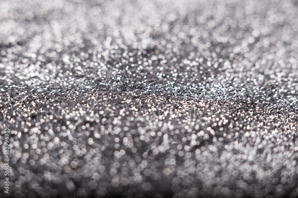 Golden and silver glitter backgound with bokeh abstract effect Golden and silver glitter backgound with bokeh abstract effect