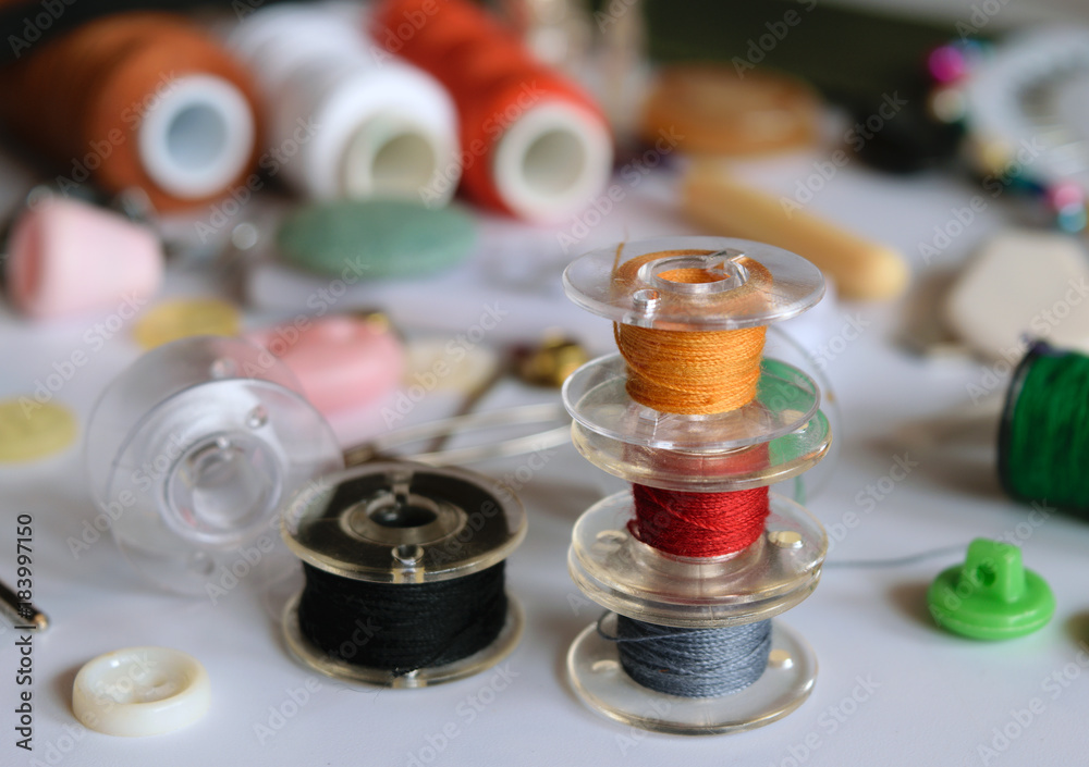 Set of tailoring tools and accessories on table Set of tailoring tools and accessories on table