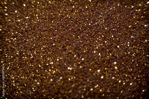 Golden and silver glitter backgound with bokeh abstract effect