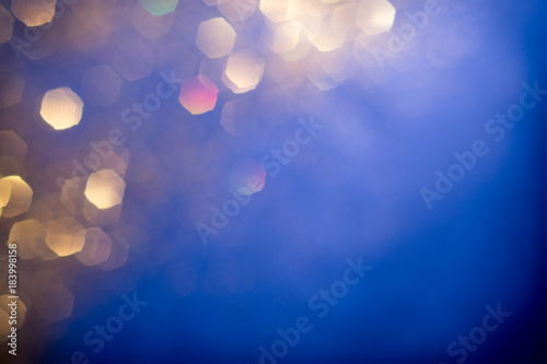 Golden and silver glitter backgound with bokeh abstract effect
