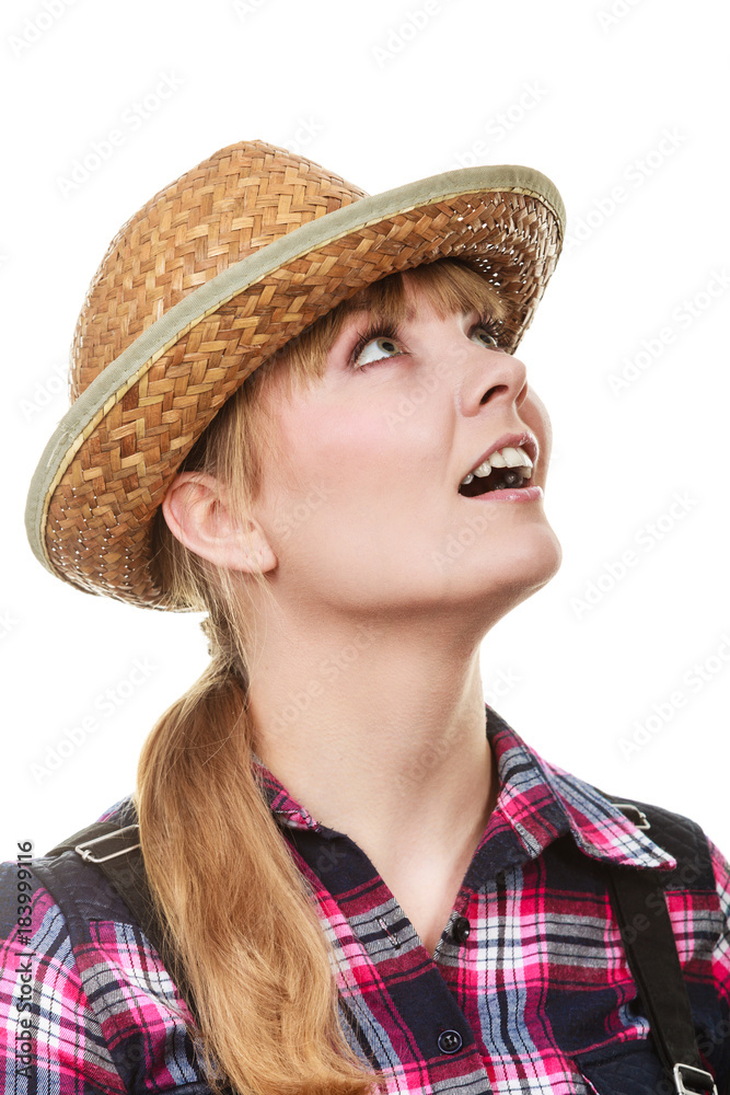 Shocked and surprised gardener woman looking up Shocked and surprised gardener woman looking up