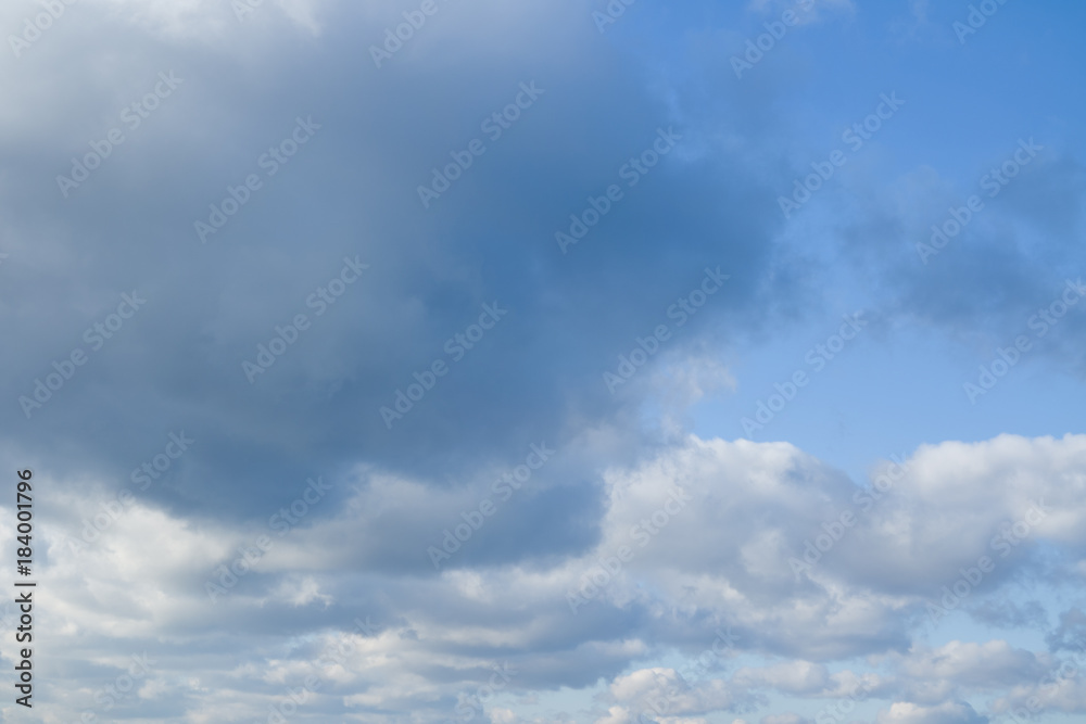 Beautiful blue sky and clouds. Clouds flying against blue sky. Sky background without birds and noise.