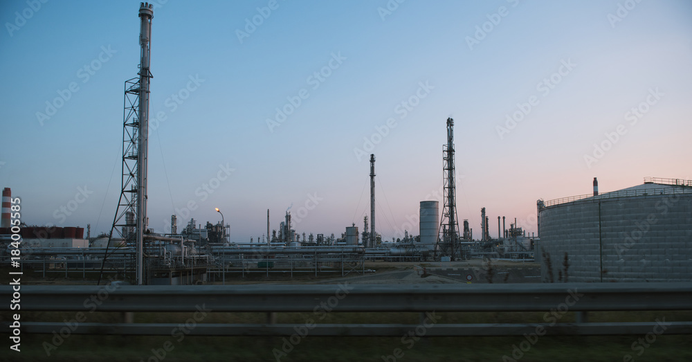 View of industrial factory during sunset View of industrial factory during sunset