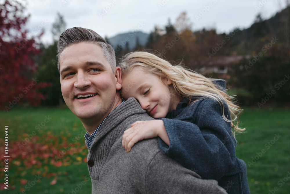 Dad and daughter spending bonding time together in backyard Dad and daughter spending bonding time together in backyard