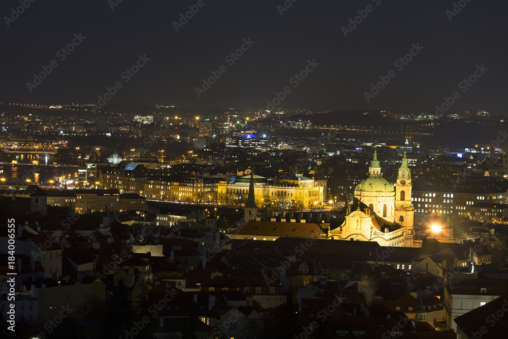 Winter night Prague City with St. Nicholas' Cathedral, Czech Republic