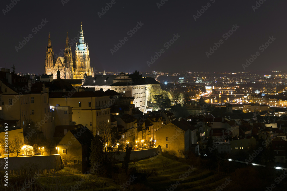 Winter night Prague City with gothic Castle, Czech Republic