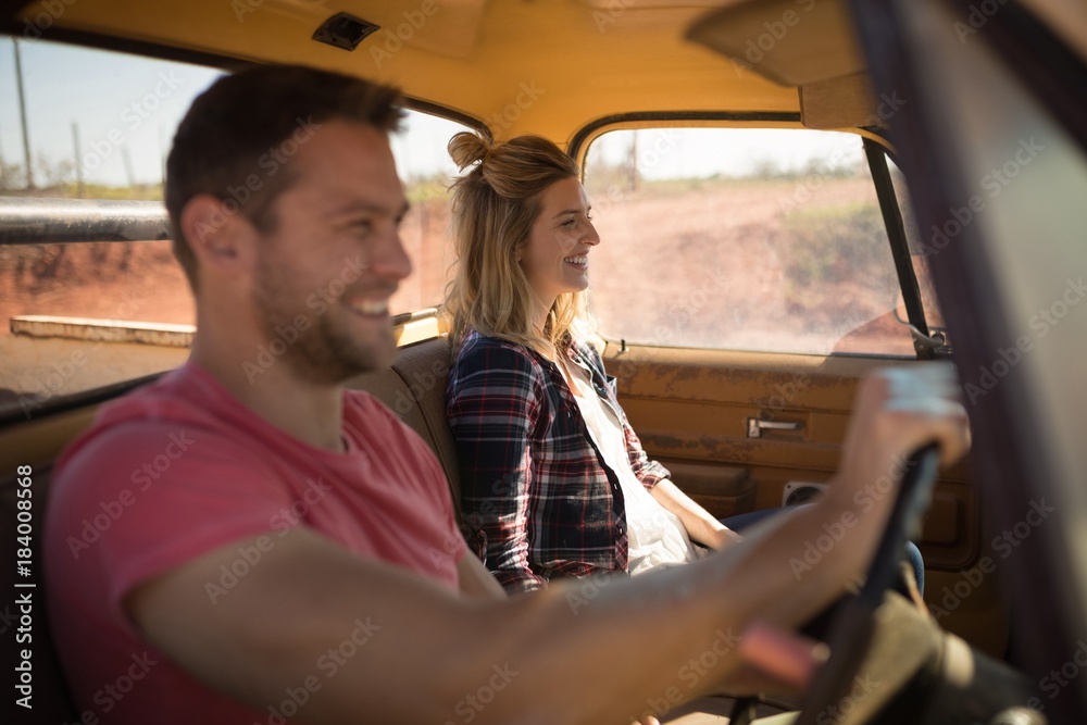 Couple sitting together in a car Couple sitting together in a car