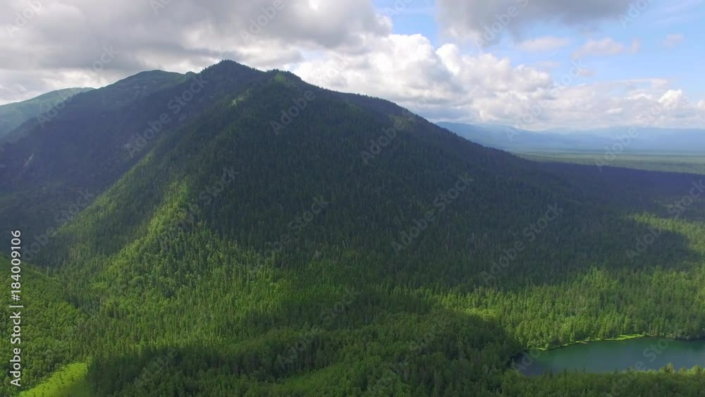 Aerial photography. Heavenly landscape of the landscape with a mountain lake in Siberia near Lake Baikal. Warm lake of the Snezhnaya River. Vydrino Aerial photography. Heavenly landscape of the landscape with a mountain lake in Siberia near Lake Baikal. Warm lake of the Snezhnaya River. Vydrino