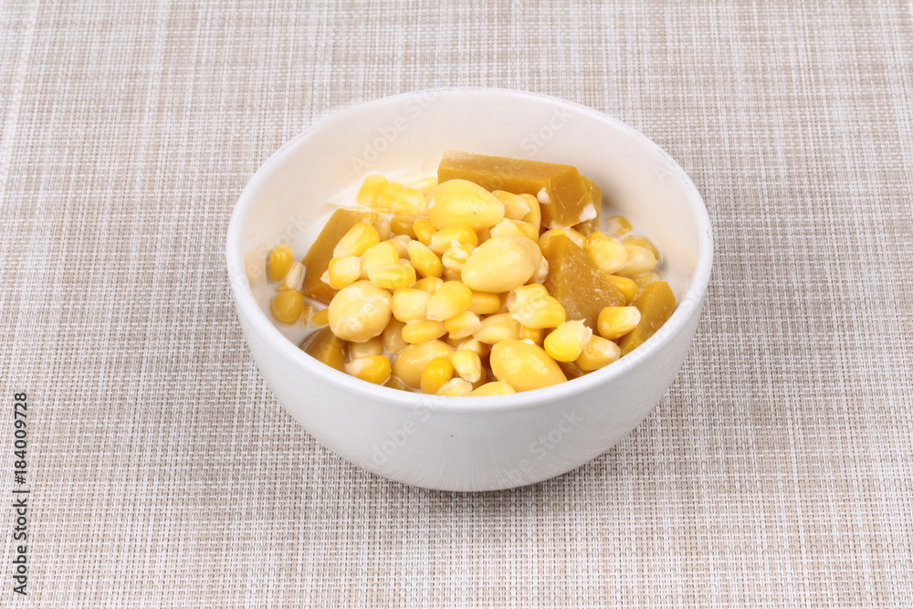Delicious streamed sweet corn ,pumpkin and ,ginkgo in coconut milk . Delicious streamed sweet corn ,pumpkin and ,ginkgo in coconut milk .
